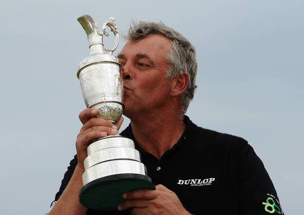 Golf - The Open 2011 - Royal St George s - Day 4 Darren Clarke of Northern Ireland kisses the Claret Jug in celebration after winning the Open Championshp at Royal St Georges, in Sandwich 