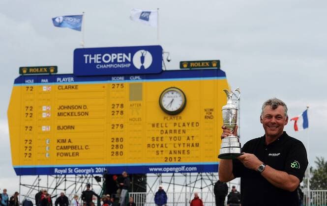 Golf - The Open 2011 - Royal St George s - Day 4 Darren Clarke of Northern Ireland poses with the Claret Jug infront of the leaderboard after winning the Open Championship at Royal St Georges, in Sandwich  o0 Pokal Anzeigetafel, Anzeige, Tafel Leaderboard