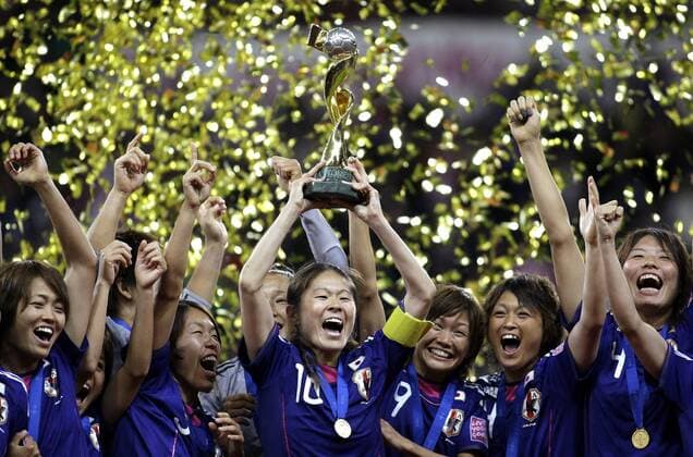 Japan s Homare SAWA (JPN) and team celebrate the win of the cup during the final match of the Women s Soccer World Cup - Commerzbank-Arena in Frankfurt