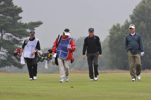 21.07.2011 Bernard Langer (GER) and John Cook (USA) in action in Round 1 at the Senior Open Championship from Walton Heath Golf Club. xKevinxBatchelorx  ActionPlus11195659 Content restricted for UK based newspaper