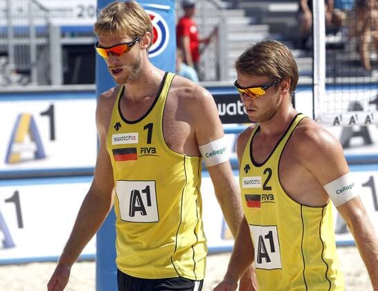 BEACHVOLLEYBALL - FIVB Grand Slam KLAGENFURT,AUSTRIA,03.AUG.11 - DIVERS, BEACH VOLLEYBALL - World Tour 2011, FIVB Grand Slam Klagenfurt. Bild zeigt Sebastian Dollinger und Stefan Windscheif (GER). 