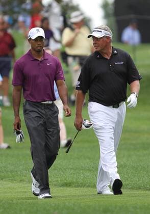 August 04 2011: Tiger Woods and Darren Clarke walking during the World Golf Championships-Bridgestone Invitational first round of play at Firestone Country Club in Akron, OH. PGA Golf Herren AUG 04 WGC Bridgestone Invitational - First Round Icon1108041233 EDITORIAL USE ONLY