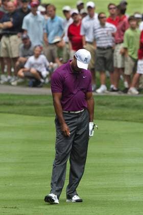 Aug. 4, 2011 - Akron, OH, USA - Tiger Woods is unhappy with his fairway shot on the 2nd hole during the opening round at the 2011 WGC-Bridgestone Invitational at Firestone Country Club on Thursday, August 4, 2011, in Akron, Ohio. GLF-BRIDGESTONE - ZUMAm67
