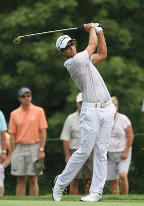 August 05 2011: Adam Scott looking at his shot with a piece of the fairway on his club during the World Golf Championships-Bridgestone Invitational second round of play at Firestone Country Club in Akron, OH. PGA Golf Herren AUG 05 WGC Bridgestone Invitational - Second Round Icon1108051567 EDITORIAL USE ONLY