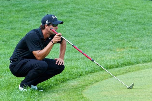 Aug. 7, 2011 - Akron, Ohio, U.S - Adam Scott lines up a putt on the 18th green during the final round of the Bridgestone Invitational at Firestone Country Club, Akron, Oh. PGA Golf Herren 2011 - Aug 7 - Bridgestone Invitational - ZUMAx09