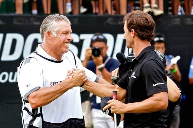Aug. 7, 2011 - Akron, Ohio, U.S - Adam Scott, right, shakes hands with his caddie Steve Williams after the final round of the Bridgestone Invitational at Firestone Country Club, Akron, Oh. PGA Golf Herren 2011 - Aug 7 - Bridgestone Invitational - ZUMAx09