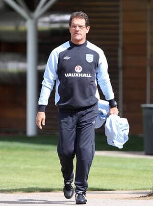 Englands Fabio Capello during training - England 9th August, 2011 EDITORIAL USE ONLY. No use with unauthorised audio, video, data, fixture lists, club league logos or live services. Online in-match use limited to 120 images, no video emulation. No use in betting, games or single club league player publications.