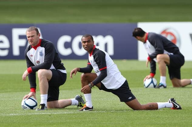 Englands Wayne Rooney and Ashley Cole during training - England 9th August, 2011 EDITORIAL USE ONLY. No use with unauthorised audio, video, data, fixture lists, club league logos or live services. Online in-match use limited to 120 images, no video emulation. No use in betting, games or single club league player publications.