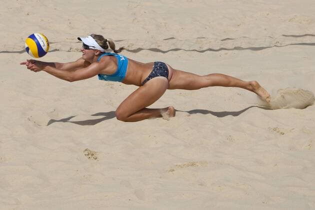 10.08.2011 Heather Bansley (CAN) dives for the ball during the FIVB International Beach Volleyball tournament, part of the London prepares (LOCOG) 2012 Olympic test events held at Horse Guards Parade, Westminster, London. xMitchellxGunnx  ActionPlus11200066 Content restricted for UK based newspaper