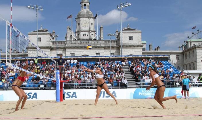Lisa Rutledge (USA) vs. Liliane Maestrini and Angela Vieira (BRA) in the Visa FIVB Beach Volleyball International test event in London s Horseguard s parade on Wednesday August 10 2011.  LON2011081010