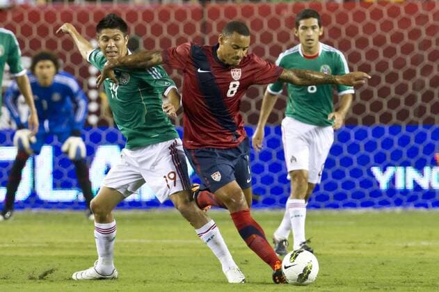 August 10, 2011: USA midfielder Jermaine Jones (8) going after the ball while Mexico forward Oribe Peralta (19) is going after it as well during the international friendly match between the USA and Mexico at Lincoln Financial Field in Philadelphia, Pennsylvania. - ZUMAcs7
