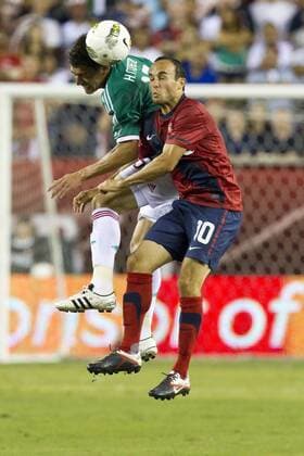August 10, 2011: Mexico defender Hector Moreno (15) gets the header over USA forward Landon Donovan (10) during the international friendly match between the USA and Mexico at Lincoln Financial Field in Philadelphia, Pennsylvania. - ZUMAcs7