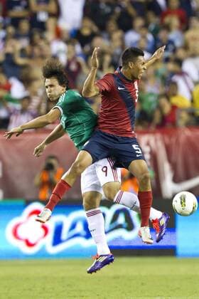 August 10, 2011: USA defender Michael Orozco Fiscal (5) colliding in mid air with Mexico forward Omar Arellano (9) as they go after the ball during the international friendly match between the USA and Mexico at Lincoln Financial Field in Philadelphia, Pennsylvania. USA and Mexico tied 1-1. - ZUMAcs7