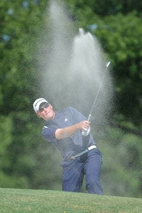 Aug. 10, 2011 - Johns Creek, Georgia, United States of America - Robert McClellan blasts a shot out of the sand during the practice rounds on Wednesday before the beginning of the PGA Golf Herren Championships at the Atlanta Athletic Club in Johns Creek, GA. PGA Golf Herren GOLF 2011 - Aug 10 - 93rd PGA Golf Herren Championships - Practice Round - ZUMAq91