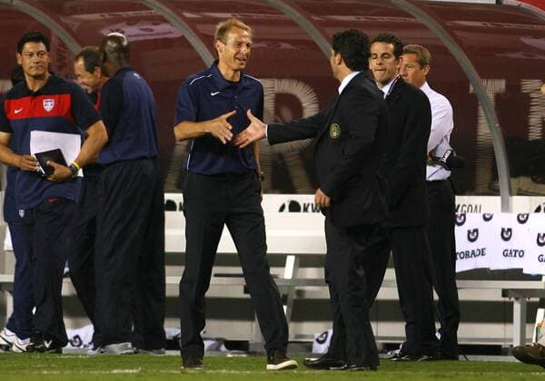 August 10 2011: Jurgen Klinsmann, new coach of the USA MNT greets Mexico coach Jose Manuel de la Torre during his first game in charge against Mexico at Lincoln Financial Field, in Philadelphia, Pennsylvania. SOCCER: AUG10 Mexico at USA Icon25511081023 EDITORIAL USE ONLY
