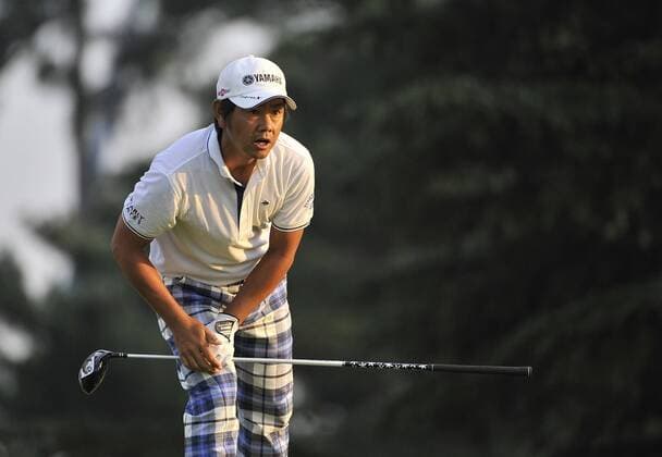 Hiroyuki Fujita of Japan watches his tee shot on the 10th hole during the second round of the 93rd PGA Golf Herren Championship at the Atlanta Athletic Club on August 12, 2011 in Johns Creek, Georgia.  BKX2011081207