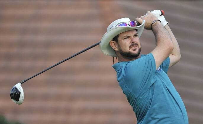 Rory Sabbatini of South Africa hits his tee shot on the 1st hole during the second round of the 93rd PGA Golf Herren Championship at the Atlanta Athletic Club on August 12, 2011 in Johns Creek, Georgia.  BKX2011081210
