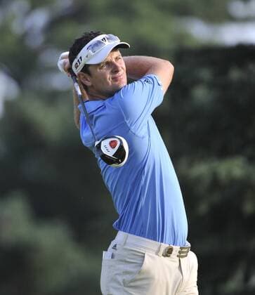 Justin Rose of England hits his tee shot on the 10th hole during the second round of the 93rd PGA Golf Herren Championship at the Atlanta Athletic Club on August 12, 2011 in Johns Creek, Georgia.  BKX2011081225