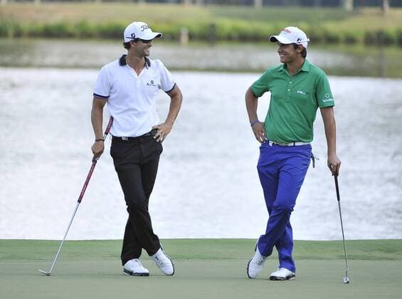 Adam Scott of Australia and Matteo Manassero of Italy stand on the 17th green during the second round of the 93rd PGA Golf Herren Championship at the Atlanta Athletic Club on August 12, 2011 in Johns Creek, Georgia.  BKX2011081287