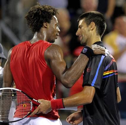 Aug. 12, 2011 - Montreal, CAN - Gael Monfils, left, congratulates Novak Djokovic, following Djokovic s 6-2, 6-1 win in their match at the Rogers Cup tennis tournament in Montreal, Canada, Friday, August 12, 2011. Rogers Cup tennis 2011 - ZUMAm67
