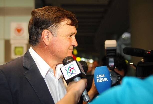 Aug 13, 2011; Beijing, CHINA; Jose Antonio Camacho of Spain arrived in Beijing on Saturday morning for his new post as coach of the Chinese national soccer team. Surrounded by flashlights from local media at the Beijing Capital International Airport, the 56-year-old kept a prudential profile and reclined to elaborate on his future plan for the team. Soccer 2011: Chinese National Soccer Team AUG 13  - ZUMAc10
