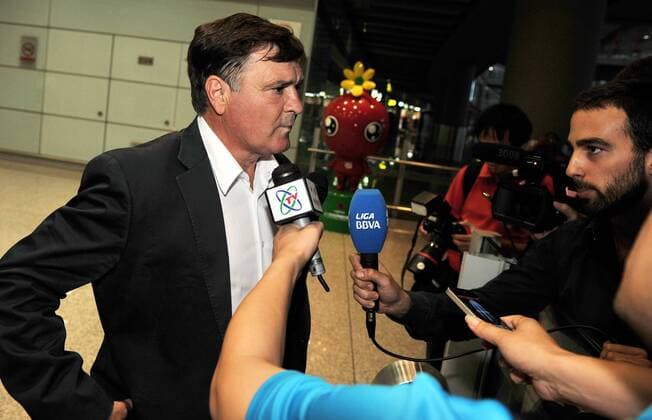 Aug 13, 2011; Beijing, CHINA; Jose Antonio Camacho of Spain arrived in Beijing on Saturday morning for his new post as coach of the Chinese national soccer team. Surrounded by flashlights from local media at the Beijing Capital International Airport, the 56-year-old kept a prudential profile and reclined to elaborate on his future plan for the team. Soccer 2011: Chinese National Soccer Team AUG 13  - ZUMAc10