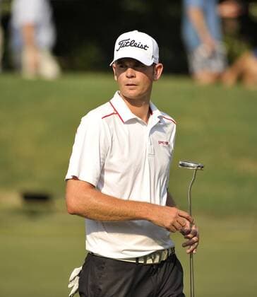Brendan Steele walks off the 15th green during the third round of the 93rd PGA Golf Herren Championship at the Atlanta Athletic Club on August 13, 2011 in Johns Creek, Georgia. After three rounds, Steele and Jason Dufner are tied for the lead of the tournament at 7 under par.  BKX2011081343