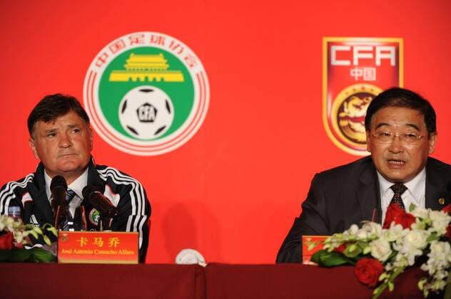 BEIJING, CHINA - AUGUST 14: (CHINA OUT) Jose Antonio Camacho, new head coach of China Men s Football Team poses with Wei Di(R), general secretary of the Chinese Football Association, during a press conference after signing for Chinese Football Association at the Sofitel Hotel on Augsut 14, 2011 in Beijing, China.  CFP420255218 