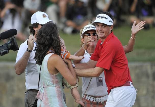 Keegan Bradley (R-L) celebrates with his mother Kaye,10-month-old nephew Aiden and sister Madison after winning the 93rd PGA Golf Herren Championship at the Atlanta Athletic Club on August 14, 2011 in Johns Creek, Georgia. Bradley defeated Jason Dufner in a three-hole playoff to win the tournament by one stroke.  BKX2011081427