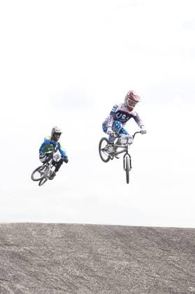 19.08.2011 Connor Fields of the USA and Renato Rezende of Brazil air over the Third Double before the First turn During the Mens Practice session at the 2011 UCI BMX Supercross World Cup, Part of the London Olympic Test Events. Olympic Park, London, England xDanxJocelynx  ActionPlus11201929 Content restricted for UK based newspaper