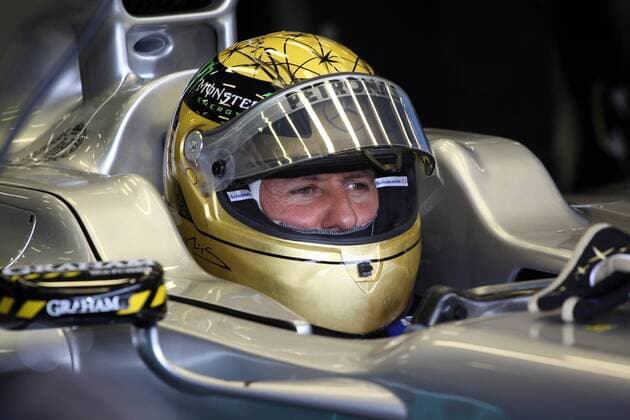 formula 1 GP, Belgien in Spa, 26.08.11, Michael Schumacher, Mercedes MGP W02, mit neuem Helm anlässlich seines 20 Jahre Formel 1 Jubiläums