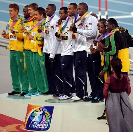 DAEGU, Sept. 3, 2011 - The gold medalists U.S. 4x400m relay team (C), Greg Nixon, Bershawn Jackson, Angelo Taylor and LaShawn Merritt (L to R) stand on the podium with silver South Africa s team (L) Shane Victor, Ofentse Mogawane, Willem de Beer, L. J. van Zyl and bronze Jamaica s team Allodin Fothergill, Jermaine Gonzales, Riker Hylton and Leford Green during the award ceremony for the men s 4x400 metres relay event at the International Association of Athletics Federations (IAAF) - World Championships in Daegu, on Sept. 3, 2011.