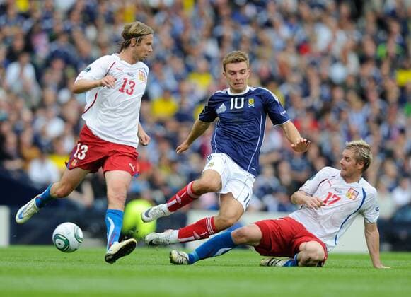 Jaroslav Plasil of Czech Republic (l) look on as James Morrison of Scotland (c) tackled by Tomas Hubschman of Czech Republic (r) European Championship Qualifying Group I Scotland v Czech Republic 3rd September, 2011 EDITORIAL USE ONLY. No use with unauthorised audio, video, data, fixture lists, club league logos or live services. Online in-match use limited to 120 images, no video emulation. No use in betting, games or single club league player publications.