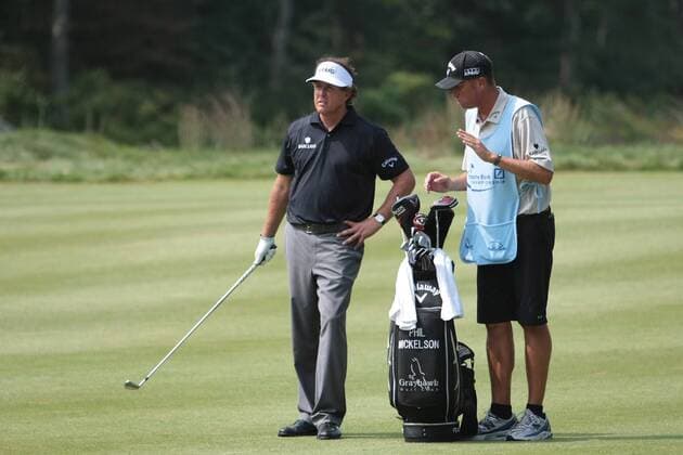04 SEP 2011: Phil Mickelson of San Diego, CA gets advice from his caddy. during the Third Round of the Deutsche Bank Championship at TPC Boston, Norton, Massachusetts on September 4, 2011. PGA Golf Herren SEP 04 Deutsche Bank Championship - Third Round Icon482110904083 EDITORIAL USE ONLY
