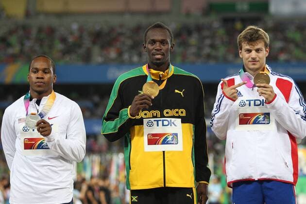 Sieger: Walter Dix USA, Usain Bolt JAM, Christophe Lemaitre FRA - nach dem Finale 200m der Männer während der Leichtathletik-WM 2011 in Daegu, 04 09 2011 ; o0 Sieg Weltmeister Medaille, Goldmedaille Objekte