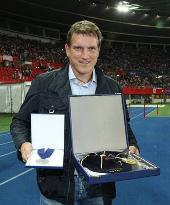 AUT vs TUR WIEN,AUSTRIA,06.SEP. 2011 - FUSSBALL - UEFA Europameisterschaft, Qualifikation, OEFB Länderspiel, Österreich vs Türkei, Ehrung von Andreas Herzog. Bild zeigt U21 Teamchef Andreas Herzog (AUT). Keywords: Medaille.  o0 U 21 Objekte
