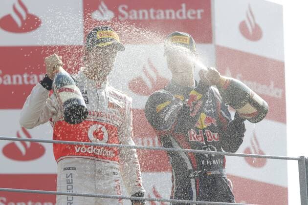 Jenson Button (McLaren Mercedes), Sieger Sebastian Vettel (Red Bull Racing) GP Italien 2011 Formel 1 Grand Prix Italien 2011 o0 Siegerehrung Sekt Sektdusche Champagner Champagnerdusche
