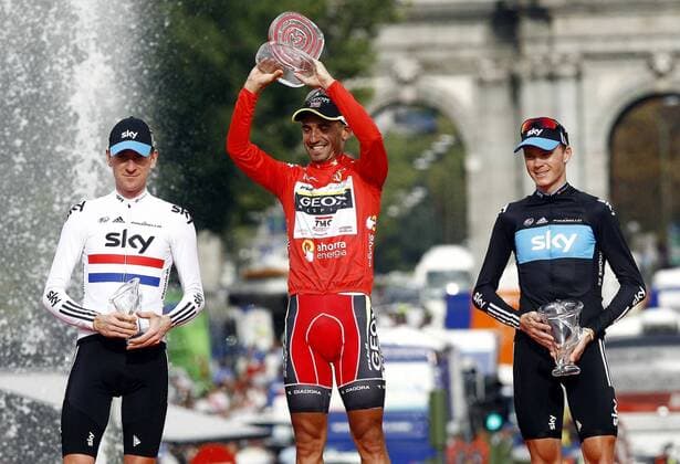 Juan Jose Cobo (c) celebrates the victory in La Vuelta 2011 in presence of Bradley Wiggins, Second place (l) and Christopher Froome,third place (r).September 11,2011.  (20110911214)