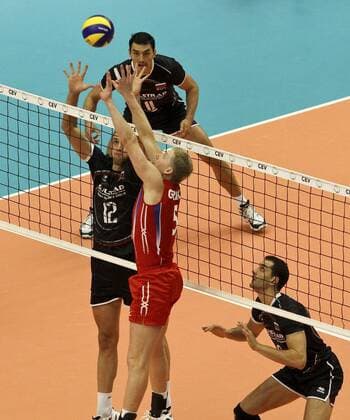 Russian, red, and Bulgarian players, black, during the quarterfinal of European Volleyball Championships 2011 in Karlovy Vary, Czech Republic on Sep. 15. 2011. (CTKxPhoto JanxSokol)  CTKPhoto1201109150874401