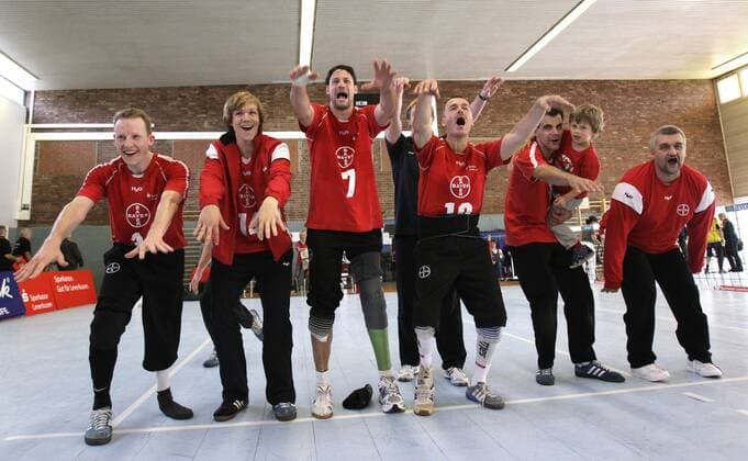 Team Leverkusen celebrate the victory about Leipzig after the final match of the German Sitting Volleyball between TSV Bayer 04 Leverkusen and Leipzig, Fritz-Jacobi-Anlage in Leverkusen on September 18., 2011. Deutsche Meisterschaften im Sitzvolleyball in Leverkusen am 18. September 2011.
