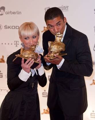 Leserpreis Sport: Die Eiskunstläufer Aljona SAVCHENKO und Robin SZOLKOWY mit der Goldenen Henne Goldene Henne 2011 - Verleihung im Stage Theater am Potsdamer Platz in Berlin am 28.09.2011.