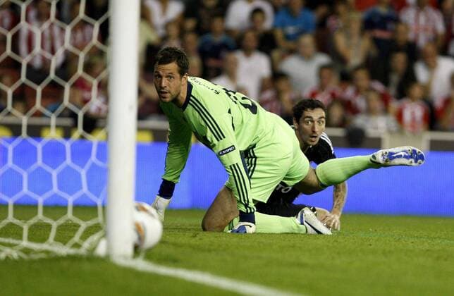 Stoke City - Besiktas Istanbul, Roberto Hilbert of Besiktas and Goalkeeper Thomas Sorensen of Stoke City. 