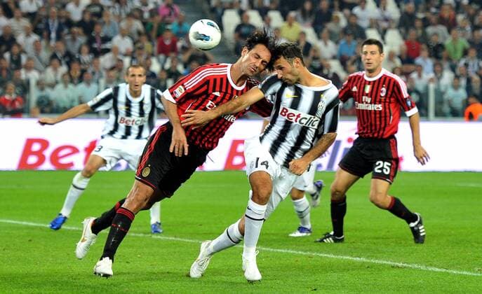 Mirko VUCINIC (Juve), Alessandro NESTA (AC), Juventus Turin - AC Mailand allexsabba