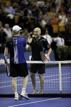 Oct 01 2011: Andre Agassi and Jim Courier shake hands after Agassi beat Courier 8-5 on Saturday night to win the Staples Champions Cup at the TD Garden, Boston Massachusetts. TENNIS: OCT 01 Champions Cup Boston Icon131111001043 o0 Senioren Sieg, Sieger EDITORIAL USE ONLY