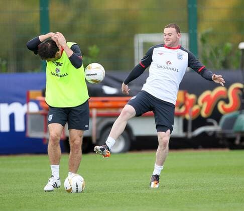Englands Frank Lampard gets scared by a ball from Wayne Rooney during training Training Training - England 4th October, 2011 EDITORIAL USE ONLY. No use with unauthorised audio, video, data, fixture lists, club league logos or live services. Online in-match use limited to 120 images, no video emulation. No use in betting, games or single club league player publications.