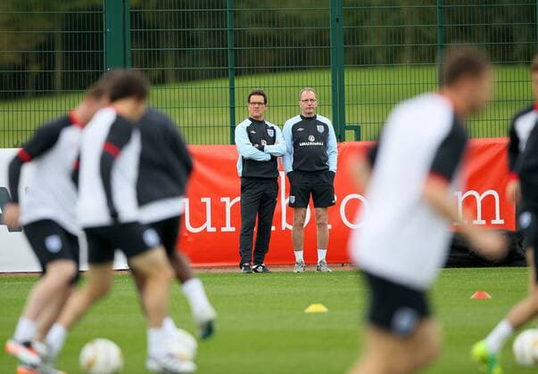 Englands Fabio Capello during training Training Training - England 4th October, 2011 EDITORIAL USE ONLY. No use with unauthorised audio, video, data, fixture lists, club league logos or live services. Online in-match use limited to 120 images, no video emulation. No use in betting, games or single club league player publications.