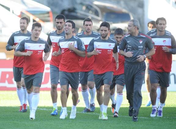 Turkey National football team players continued to do on training in Istanbul on October 04, 2011. Pictured: L to R, Emre Belozoglu, Arda Turan, Gokhan Gonul and Co trainer Engin Ipekoglu. 