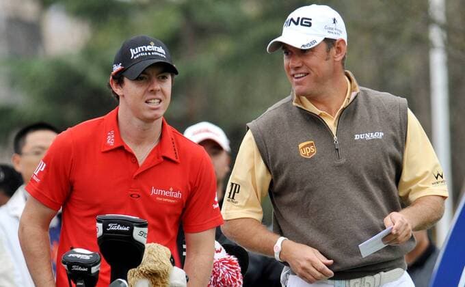 Rory McIlory of Northern Ireland, left, talks with Lee Westwood of England during the Lake Malaren Shanghai Masters golf tournament in Shanghai, China, 27 October 2011.  20111027_37613 o0 McIlroy