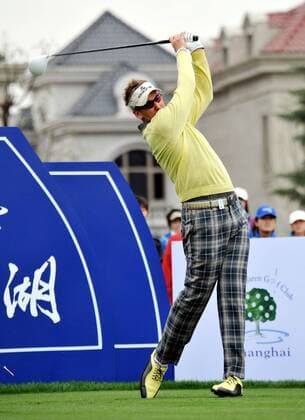 Ian Poulter of England tees off during the Lake Malaren Shanghai Masters golf tournament in Shanghai, China, 27 October 2011.  20111027_37672