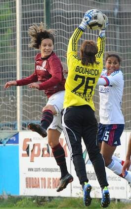 Lucie Martinkova of Sparta (left to right) and Sarah Bouhaddi and Laura Georges of Lyon fight for ball during the match of the UEFA Women s Champions League Sparta Praha vs Lyon played in Prague on Thursday, November 3, 2011. (CTKxPhoto StanxPeska)  CTKPhoto883201111030870401